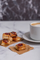 quince cookies on marble board with coffee