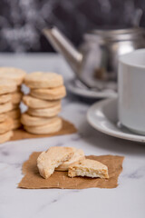 fat cookies with tea on marble