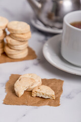 fat cookies with tea on marble