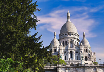 Fototapeta na wymiar The Basilica of the Sacred Heart of Paris, commonly known as Sacré-Cœur Basilica, located in the Montmartre district of Paris, France.
