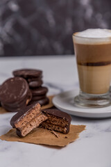 Coffee with milk and Dulce de Leche cones with sweet chocolate cones