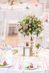 Wedding flower bouquet on a decorated festive table