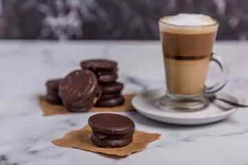 Coffee with milk and Dulce de Leche cones with sweet chocolate cones