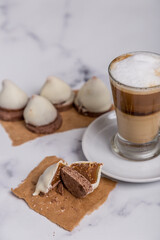 Coffee with milk and Dulce de Leche cones with sweet chocolate cones