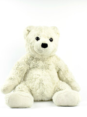 White and gray teddy bear on a white background. Kids toy