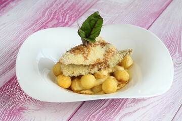 Fish in batter with potatoes