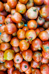 heap of pomegranate for sale in market