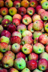 heap of apple for sale in market