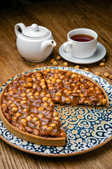 Dessert from the menu of a French restaurant. On a wooden table
