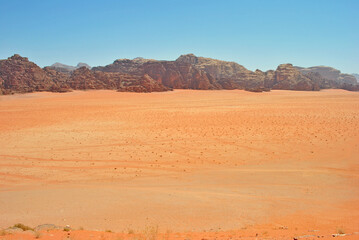 Sand and rocks. Typical landscape of Wadi Rum desert, Jordan.