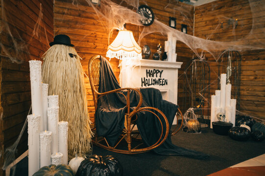 Halloween photo area design. Decorated internet with a fireplace for Halloween. Autumn decor for Halloween.