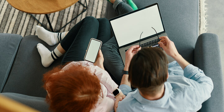 Top View Of Happy Young Family Couple Working From Home