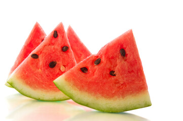 Watermelon slices on white isolated background