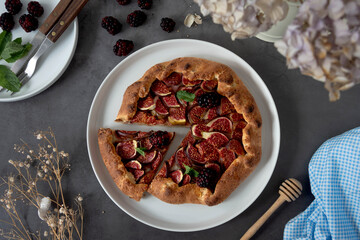 Figs galette with fresh figs. Traditional rustic fruit homemade pie, top view.