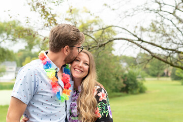 Cute young couple at a Hawaiin theme party