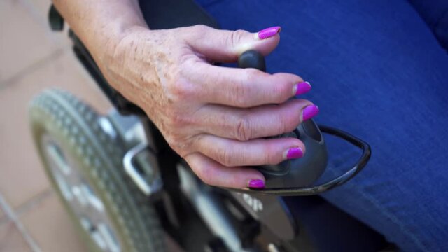 Caucasian woman in wheelchair, close-up video