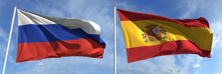 Flying flags of Russia and Spain on high flagpoles. 3d rendering
