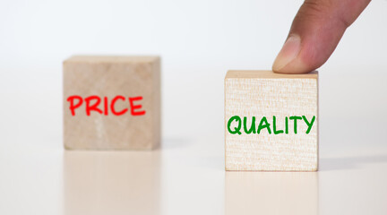 Symbol for choosing quality instead of a cheap price. Two Hands hold two dice with the words quality and price.