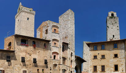 Towers of San Gimignano in the Piazza della Cisterna - obrazy, fototapety, plakaty