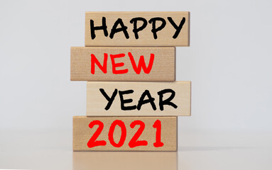 The concept of the new year. The inscription new 2021 year on wooden cubes and blocks