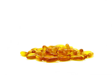 Cod liver oil omega 3 vitamin e gel capsules isolated on white background