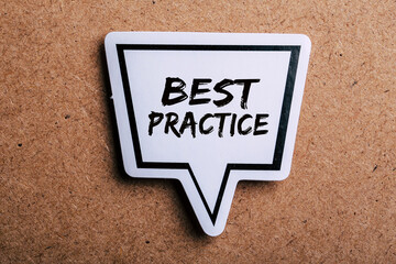 Best Practice Speech Bubble Isolated On Brown paper Background