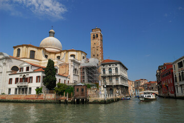 Fototapeta na wymiar San Geremia church with ancient Romanesque bell tower and Palazzo Labia Venice