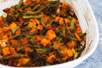 plant-based food, vegan garden vegetable roast with red pesto sauce