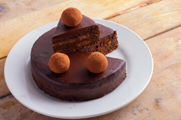 Truffle cake with black chocolate vegan balls
