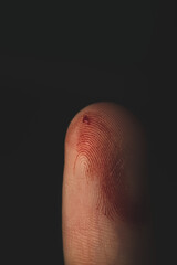 Macro close up portrait of a finger cut injury , studio lighting, selective focus