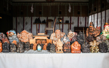 A collection of Ebisu statues at Nishinomiya Shrine in Nagano