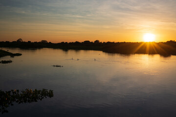 Sunset on the banks of the transpantaneira road, in the Pantanal of the State of Mato Grosso close to Pocone, Mato Grosso, Brazil on June 14, 2015.