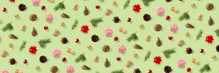 modern christmas background on green backdrop. creative flat lay for christmas time, banners, posters, prints and other creative works.