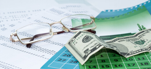 calendar sheet for saving money to finance business investment fund - finance concept.