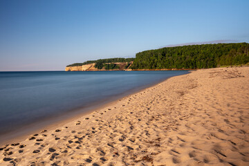 Lovers Leap Arch at Pictured Rock National Lakeshore in Michigan, view from beach. Lake Superior and beach.
