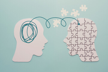 Paper heads and disorder jigsaw puzzle brain, world mental health day, Alzheimer and Psychology...