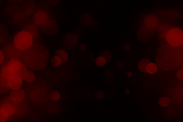 Red bokeh lights on black or dark background.