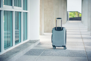 Travel Gray Luggage or suitcase at airport.Lost luggage while travel ling to hotel.Tourist forget...