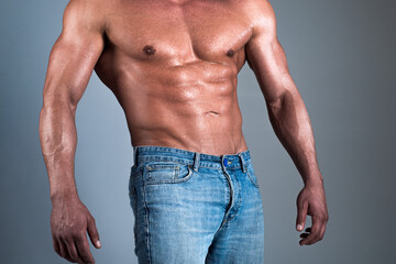 Sexy torso of a muscular man. Closeup of topless male model. Guy or muscular macho, bodybuilder,...