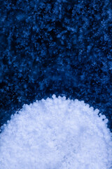 Detailed macro photo of Frozen bubbles on ice of deep lake in winter. Nature background.