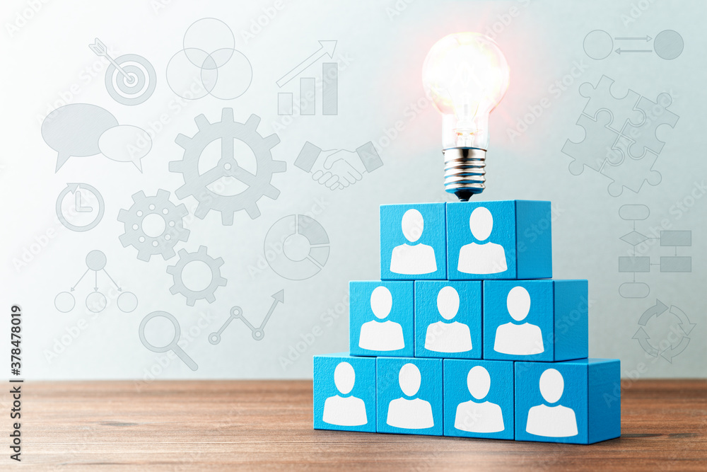 Poster teamwork of business management and strategy. lightbulb and stacked blue blocks with person icons on
