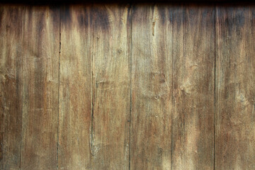 Dark brown rustic board background with old wood grain. Antique or vintage themed design application