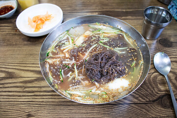 Delicious korean style cold noodles In a bowl.