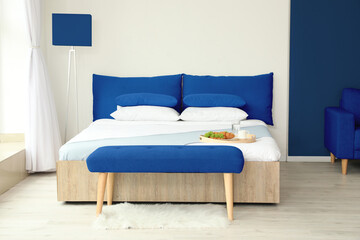 Stylish interior of modern bedroom
