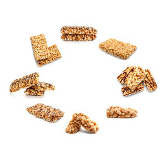 Frame made of crispy rice bars on white background