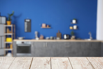 Empty wooden table in modern kitchen