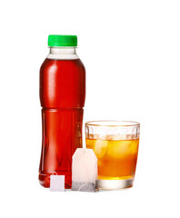 Bottle and glass of fresh ice tea on white background