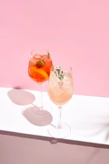 Foto op Plexiglas Aperol Spritz Cocktail on pink background © Ryzhkov
