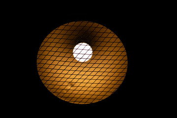 a chandelier standing on the ceiling