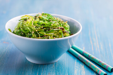 Japanese wakame salad with sesam seeds. Healthy seaweed salad.